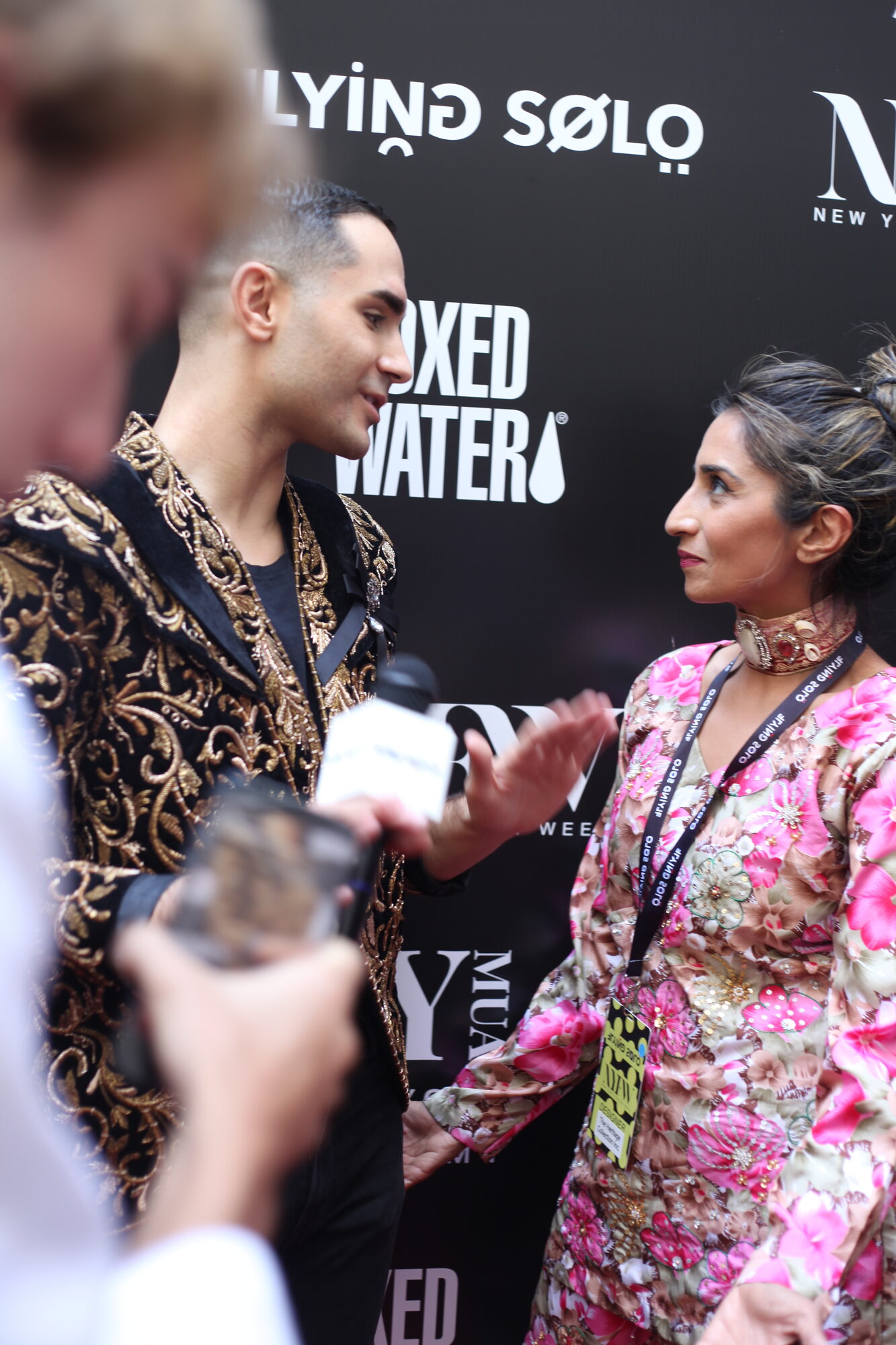 Ashraf Valliani with press at NYFW S/23